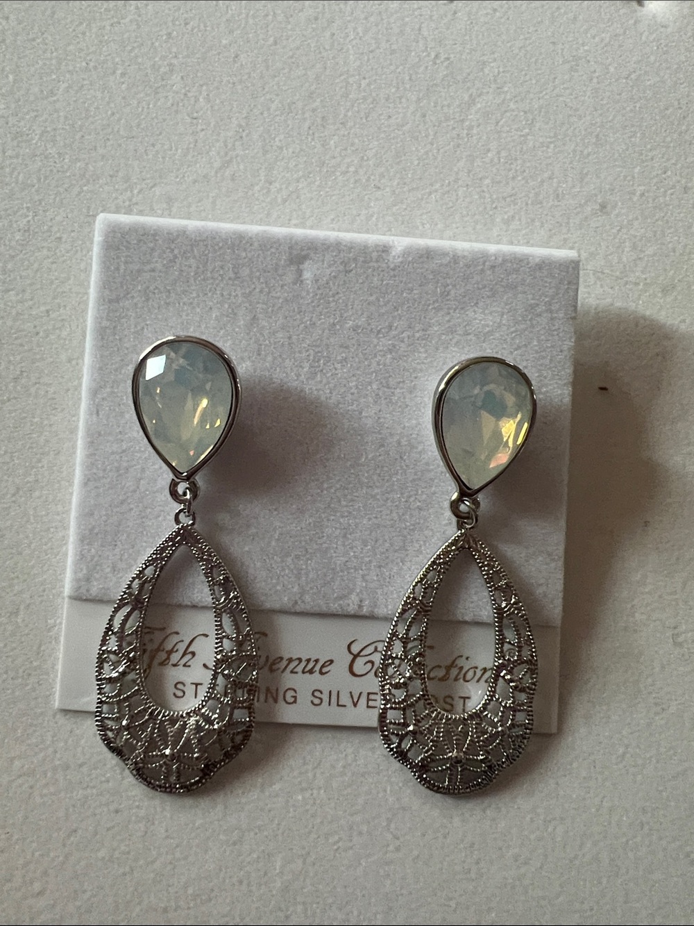 Silver Filigree Teardrop Earrings with Opalescent White Stones